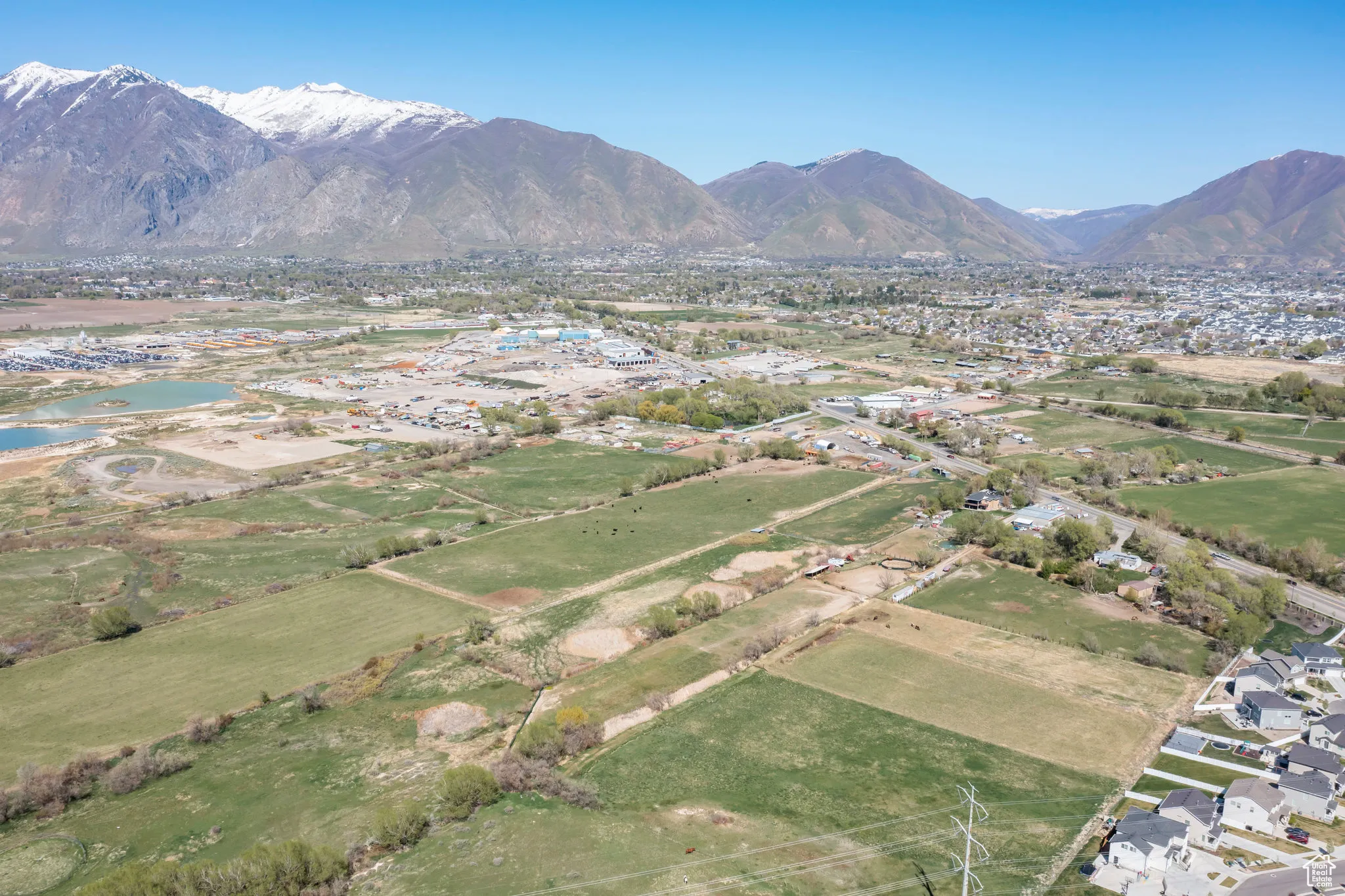 Birds eye view of property with a mountain view and a residential view