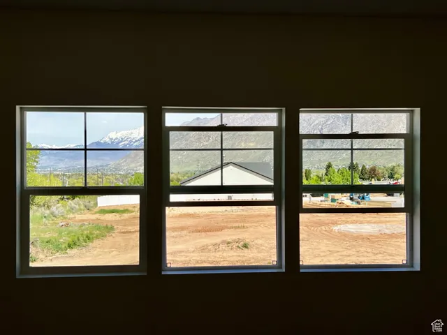 Doorway featuring a mountain view