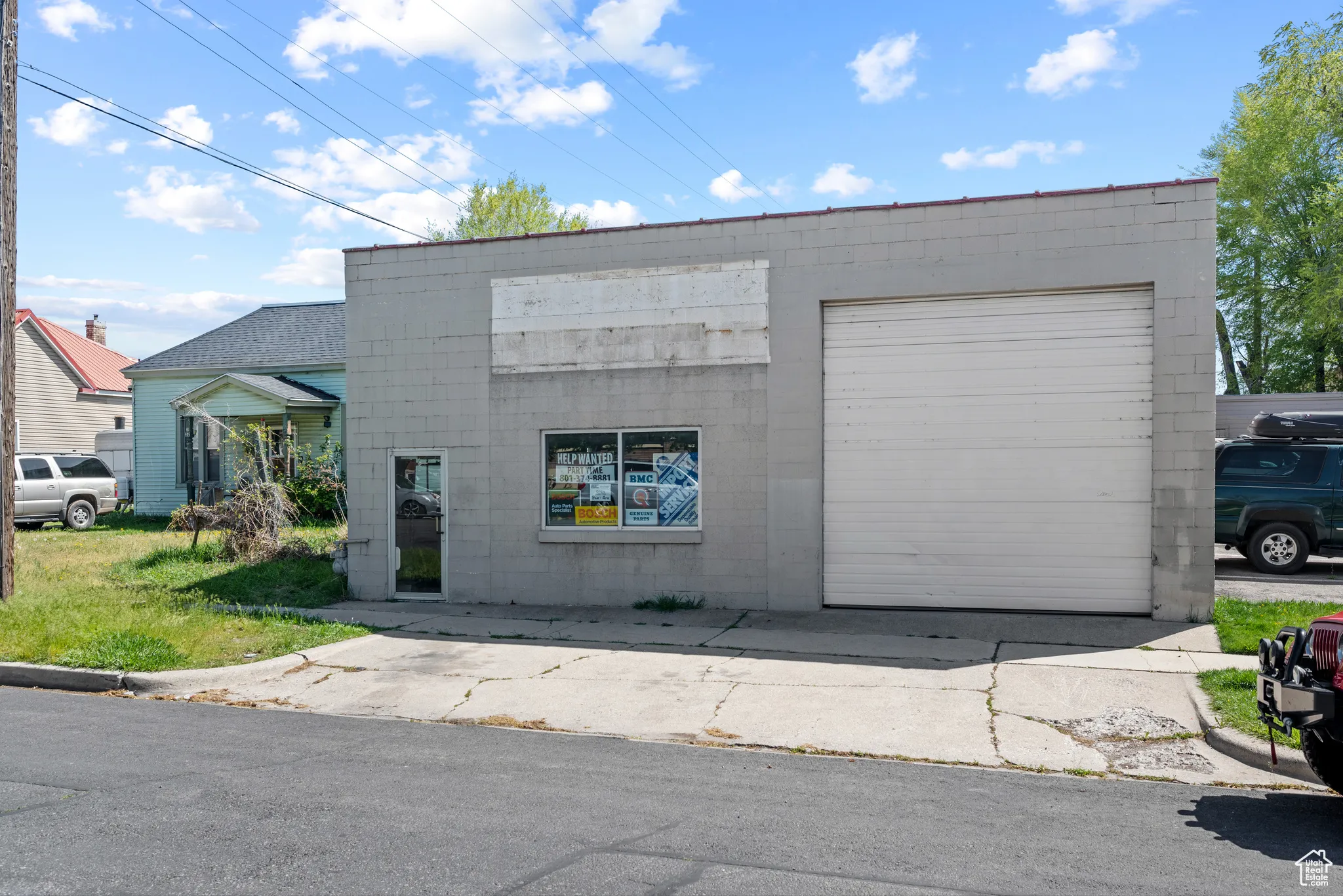 View of front of home featuring concrete block siding