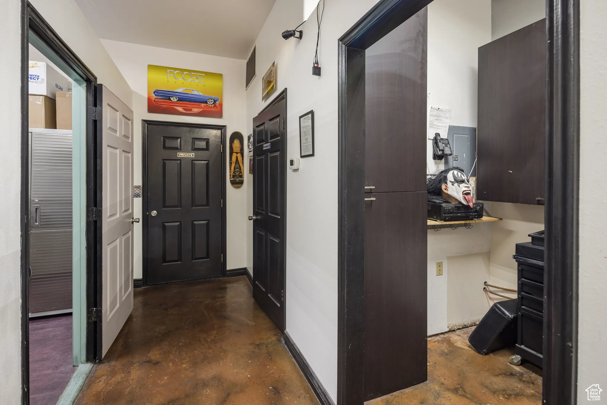 Hall featuring finished concrete floors