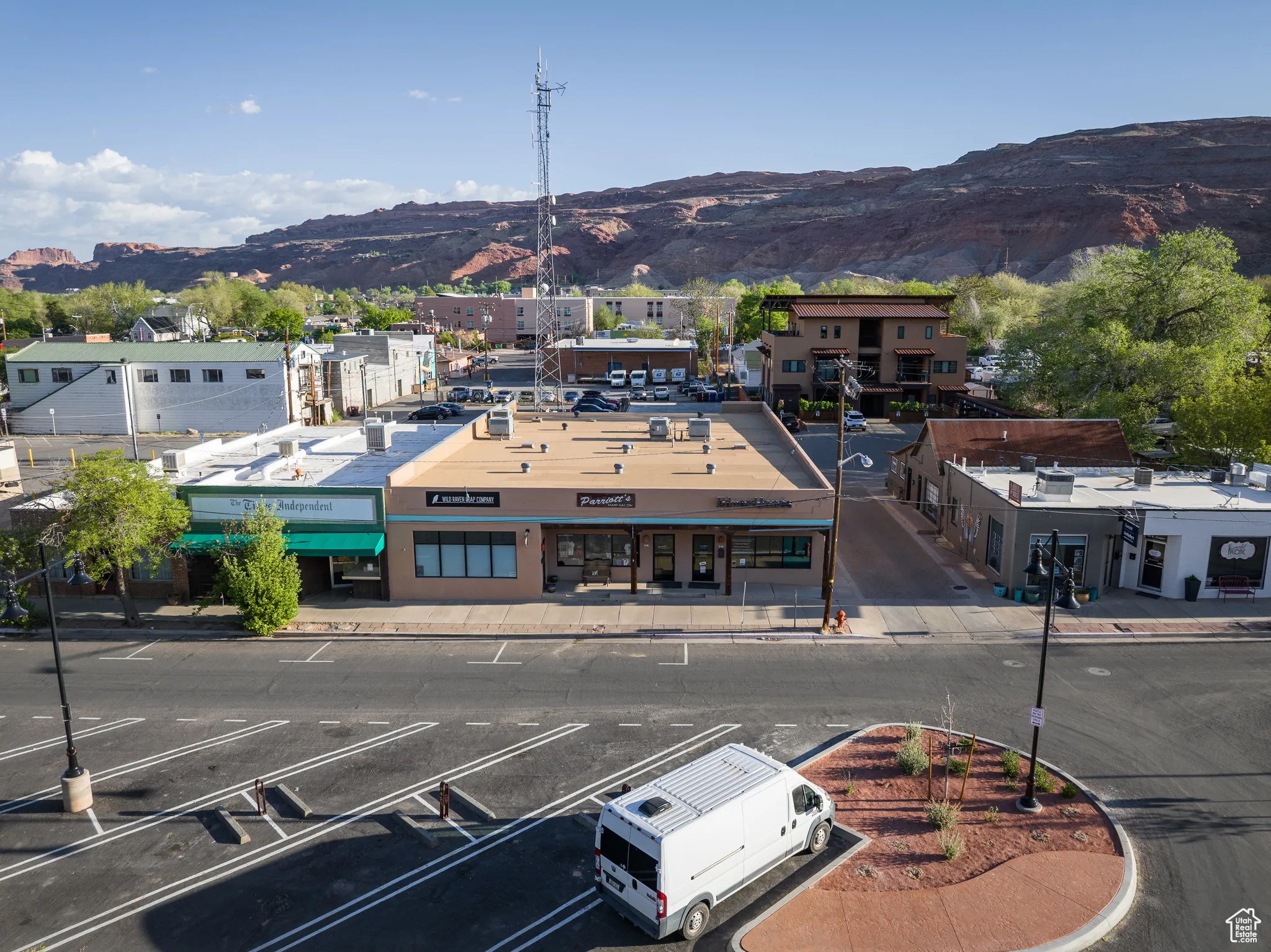 Birds eye view of property with a mountain view