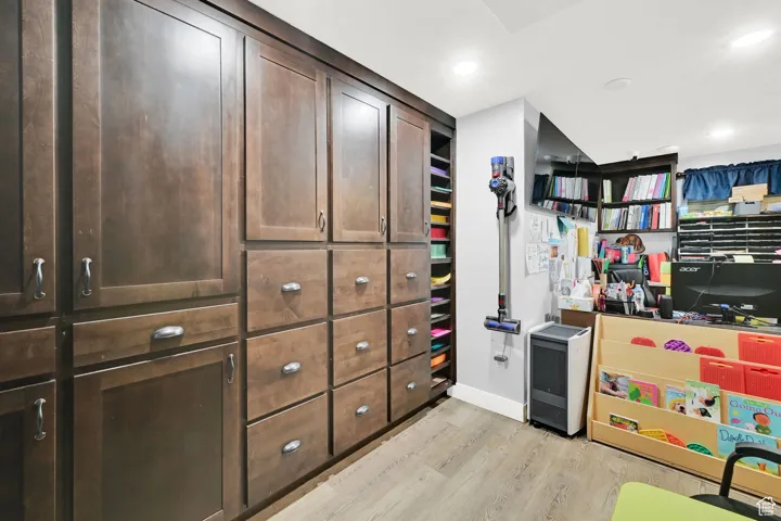 Interior space with recessed lighting, light wood-style flooring, and baseboards