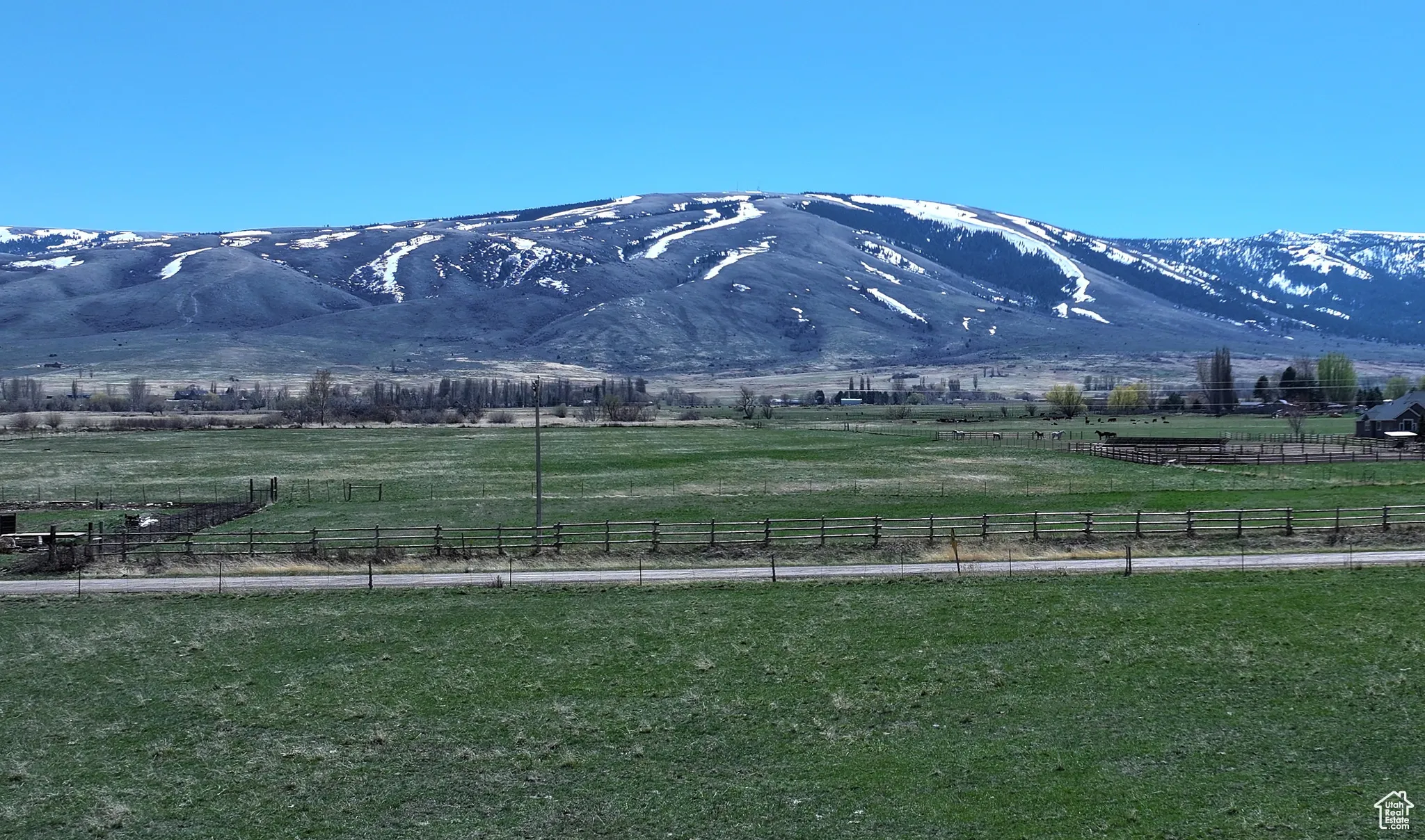 Property view of mountains with a rural view