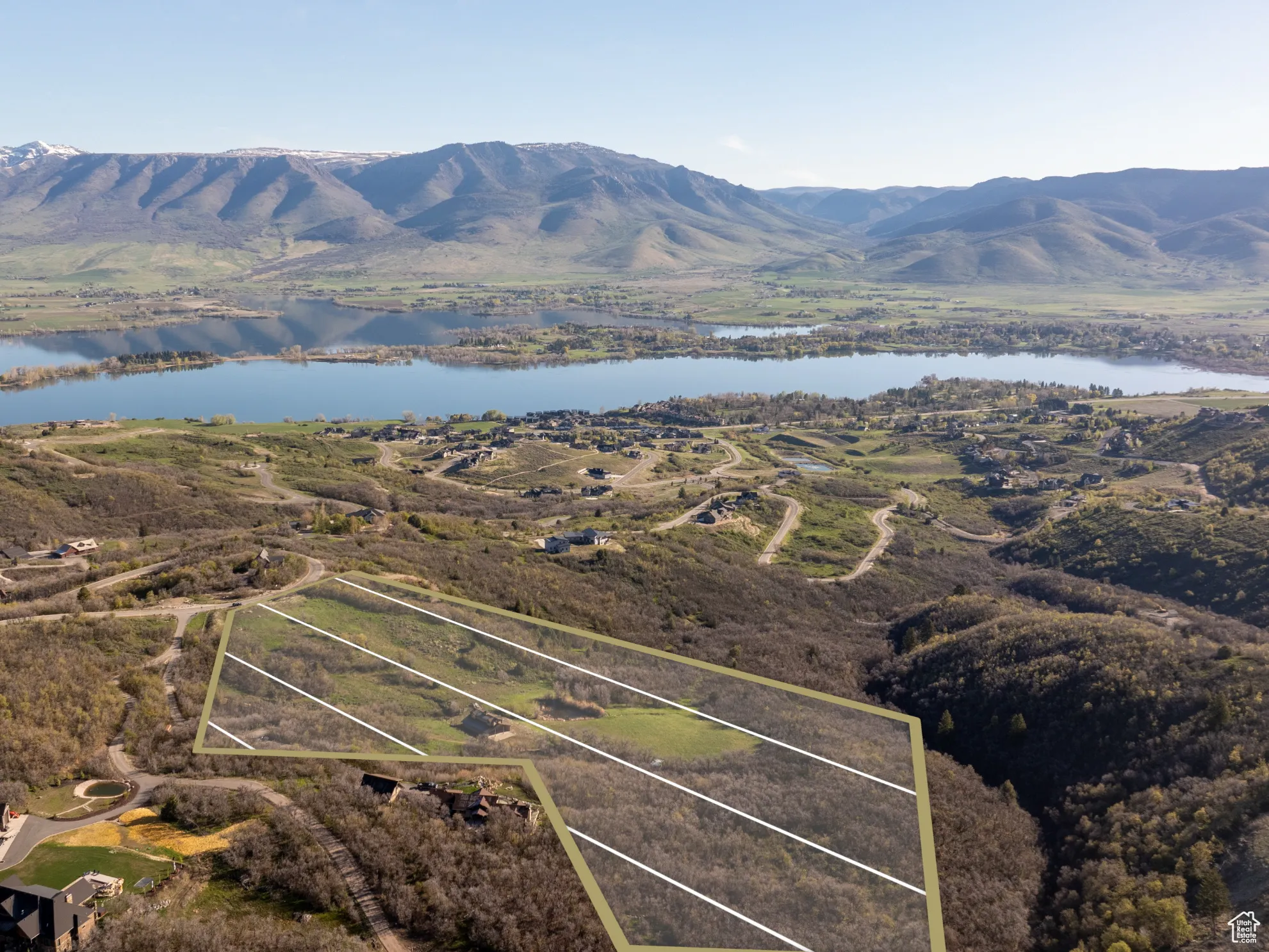 Bird's eye view with a water and mountain view