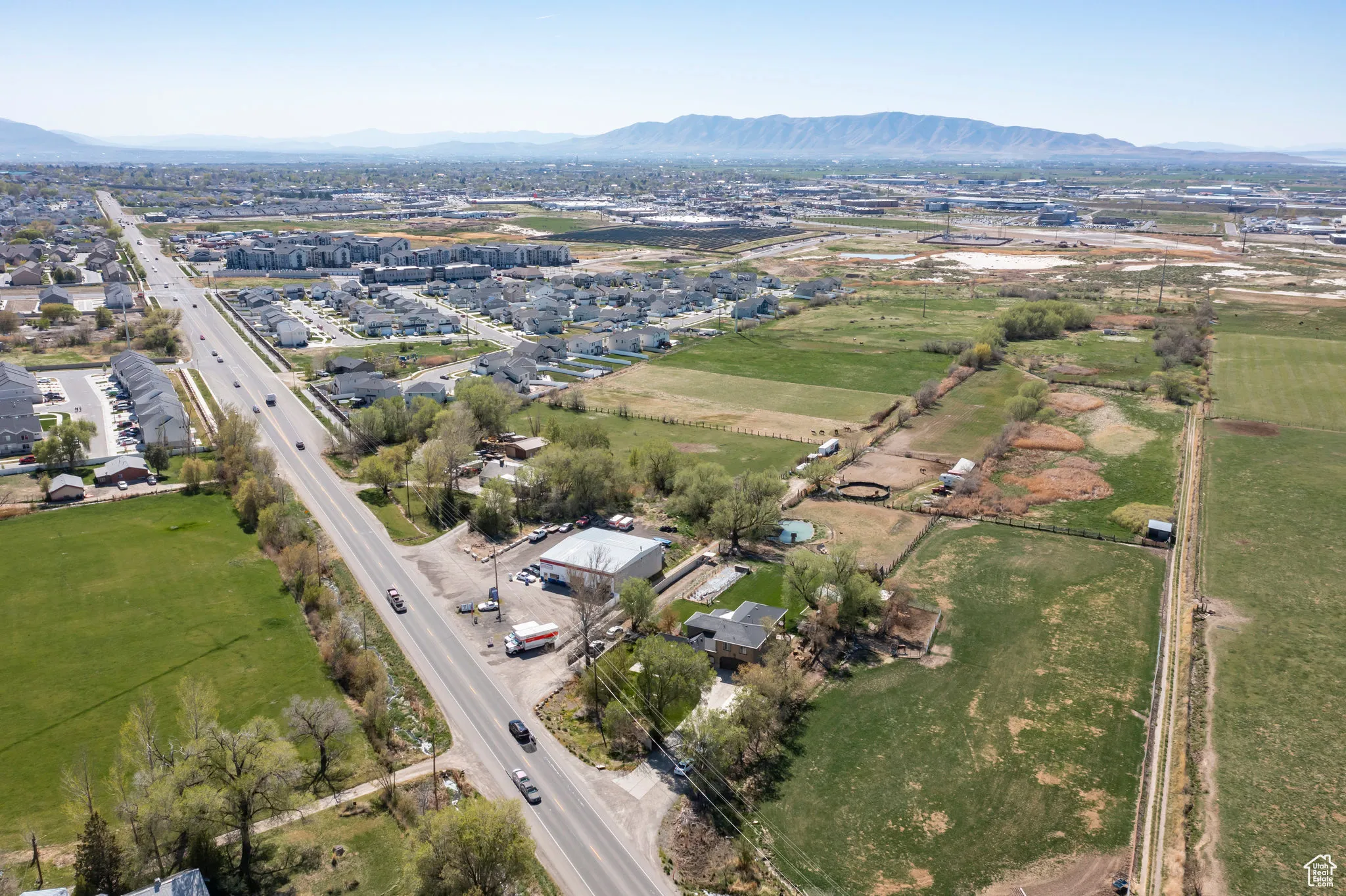 Birds eye view of property with a mountain view