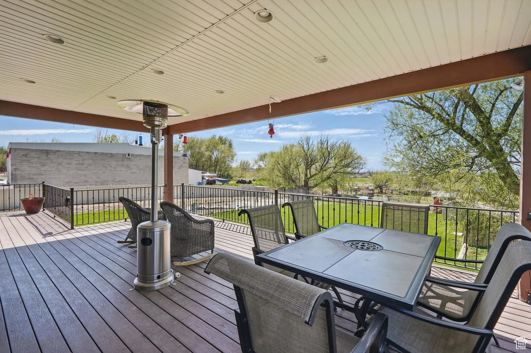 Deck featuring a lawn and outdoor dining space