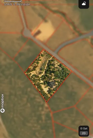 Property Map. Illustrating the property boundaries and surrounding parcels with elevation data