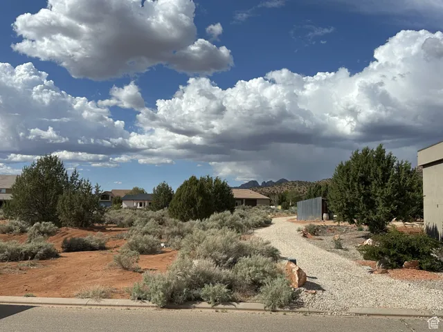 View of yard with a mountain view