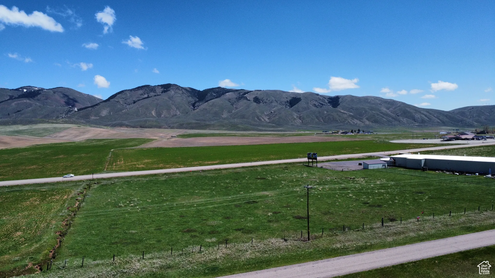 View of mountain background with rural landscape and a pastoral area