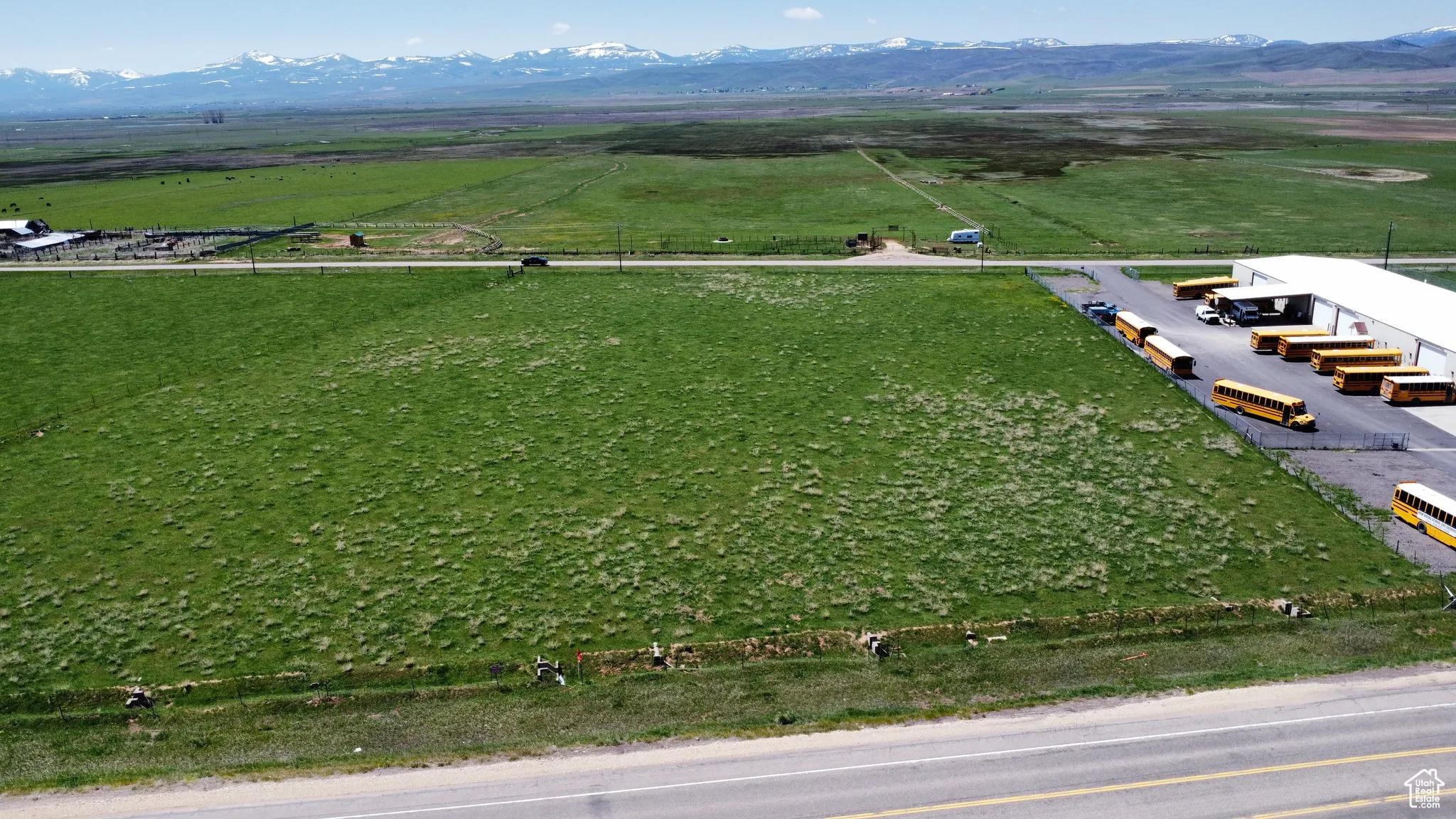 Aerial view of sparsely populated area featuring a mountain backdrop