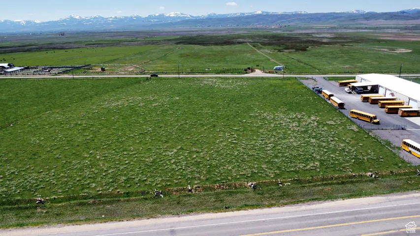Aerial view of sparsely populated area featuring a mountain backdrop