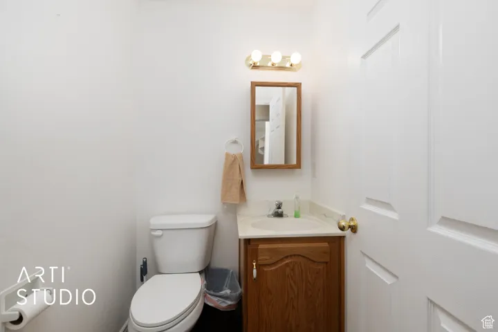 Bathroom with vanity and toilet
