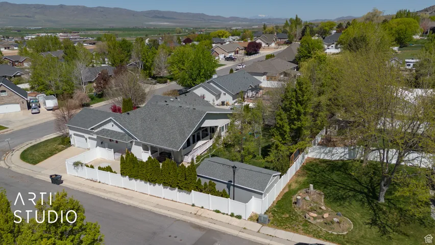 Drone / aerial view featuring a residential view and a mountain view