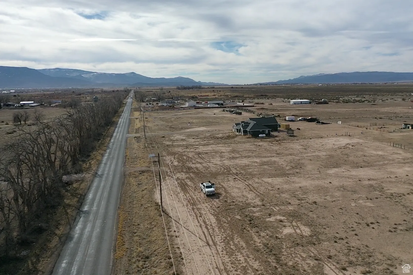 Drone / aerial view with a mountain view and a rural view