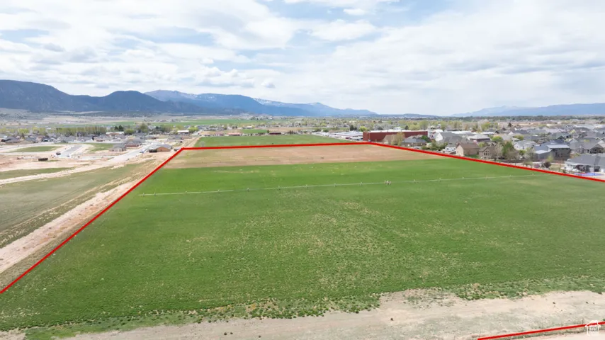 View of yard with a game area and a mountain view