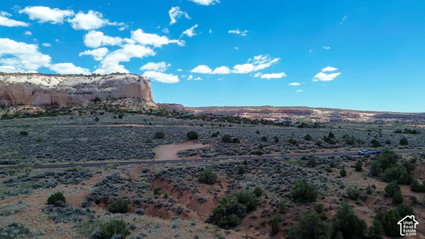 View of mountain backdrop featuring a desert landscape and rural landscape