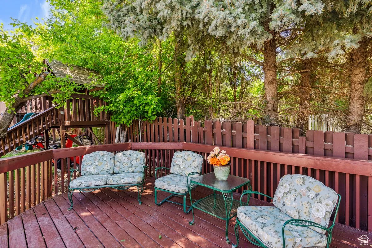 Wooden deck with a playground