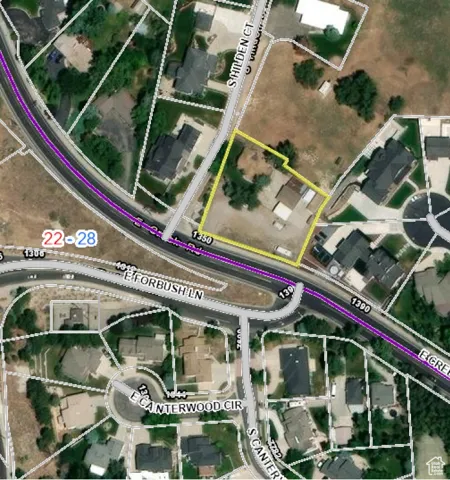 Aerial map of property and surrounding area featuring property parcel outlined