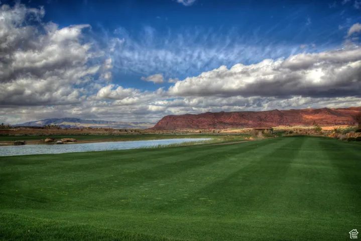 Surrounding community featuring a water and mountain view and view of golf course