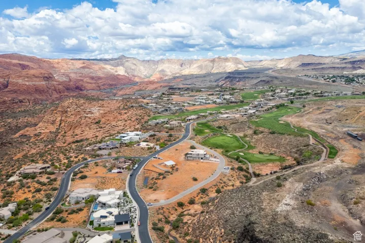 Aerial overview of property's location with mountains