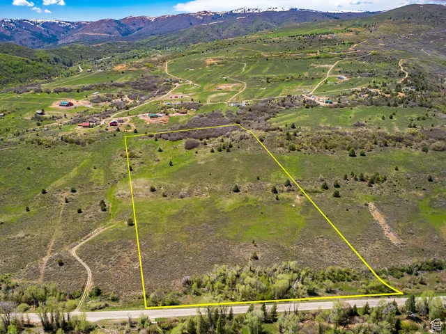 Aerial view of property with approximate property parcel outlined