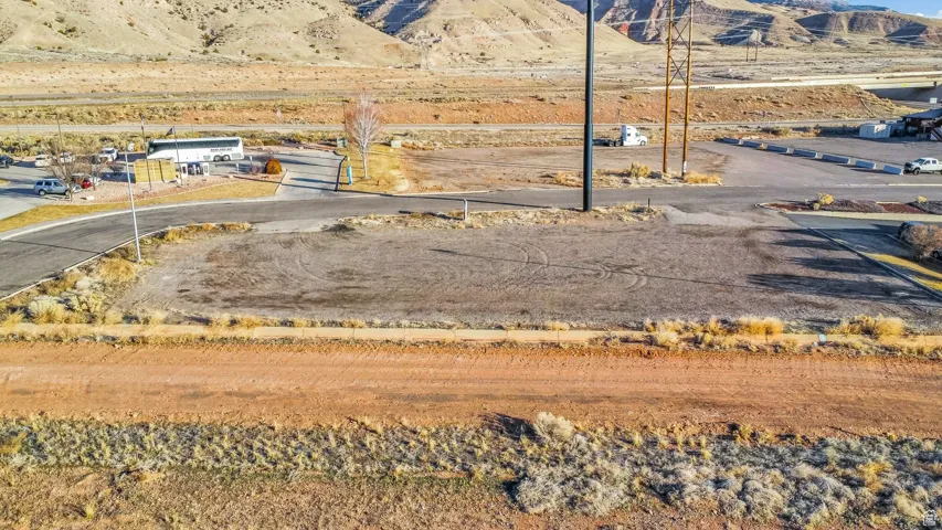 View of asphalt street featuring a mountain view