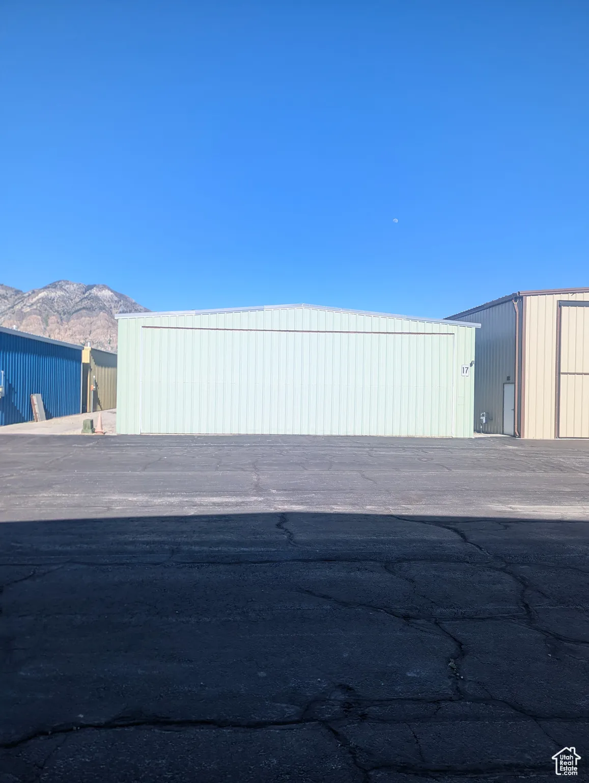 View of side of property with a mountain view