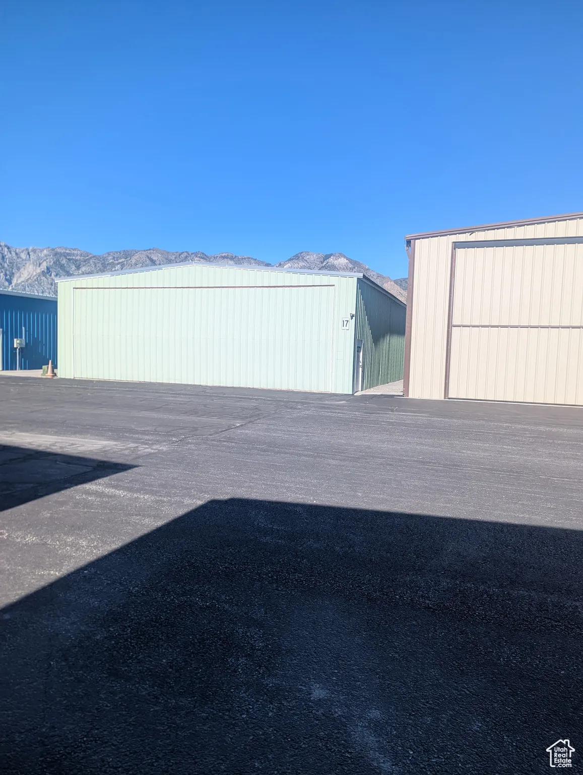Garage featuring a mountain view