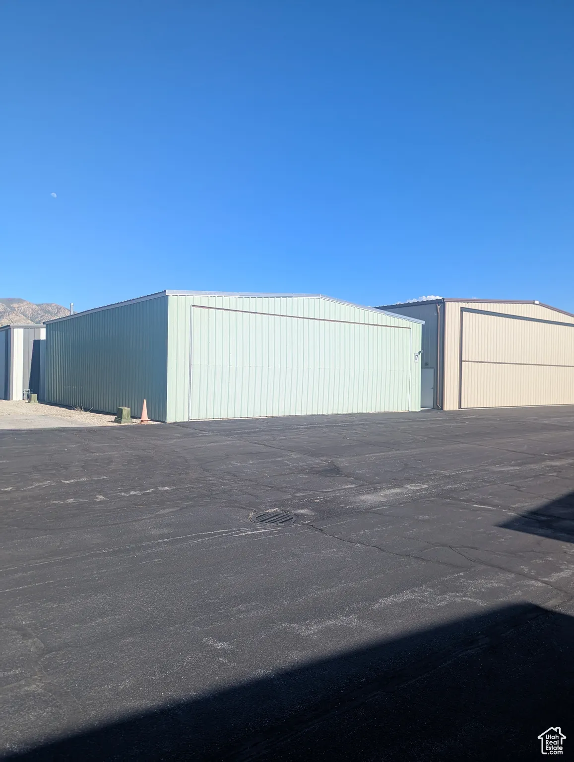 View of outbuilding with an outdoor structure