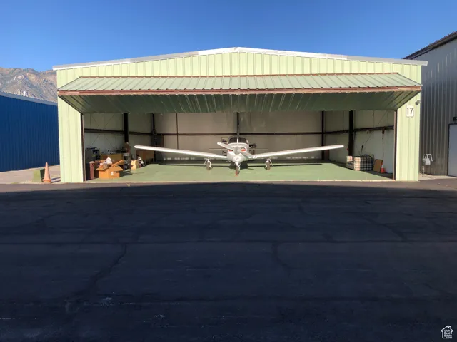 Garage featuring a mountain view