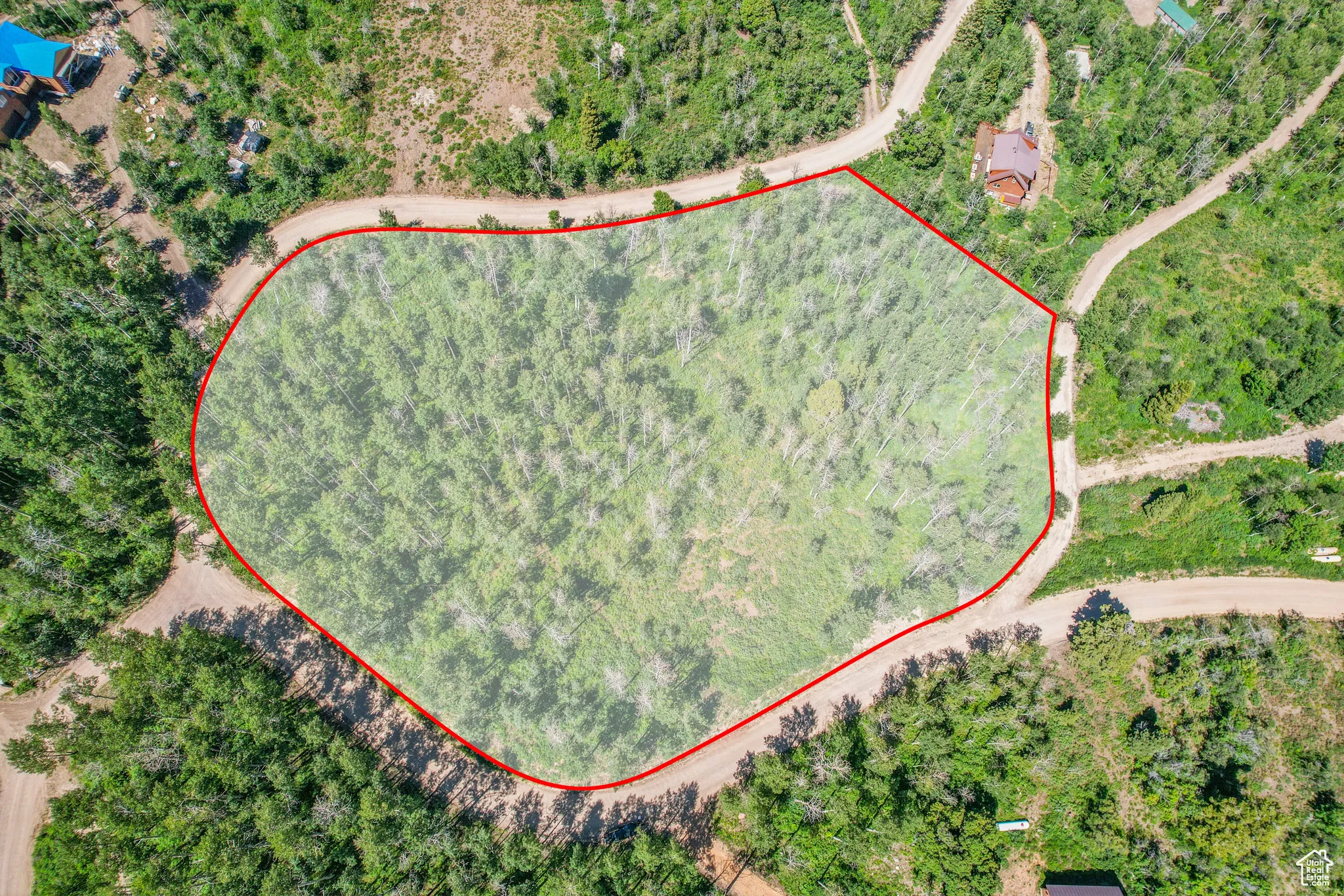 Aerial overview of property's location featuring property boundaries highlighted