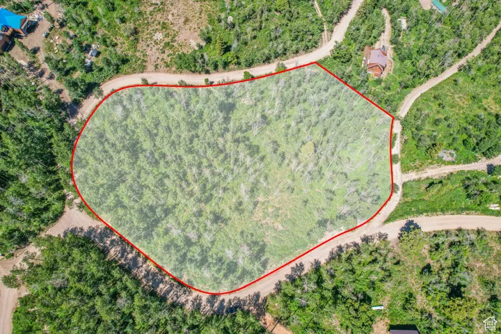Aerial overview of property's location featuring property boundaries highlighted