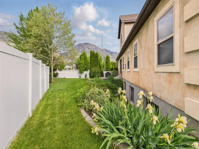 View of  side yard with a mountain view