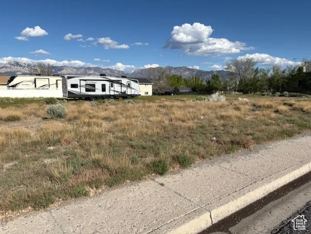 View of yard featuring a mountain view