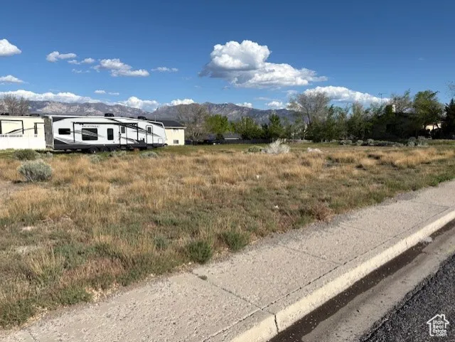 View of asphalt road featuring a mountain view