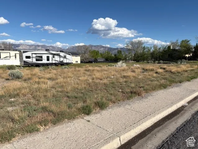 View of asphalt road featuring a mountain view