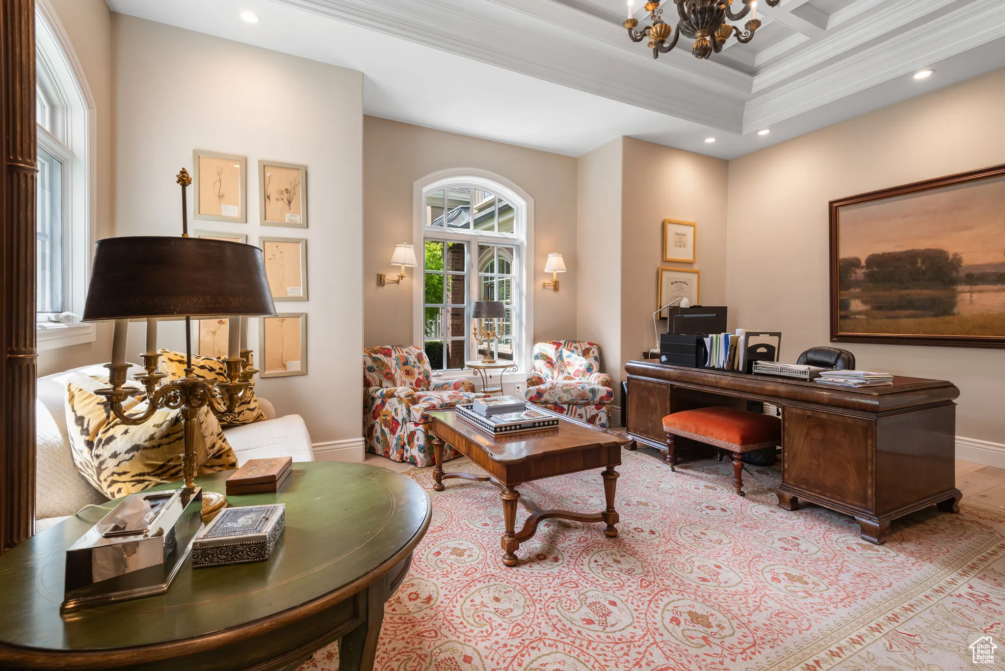 Office space with baseboards, coffered ceiling, recessed lighting, a chandelier, and crown molding