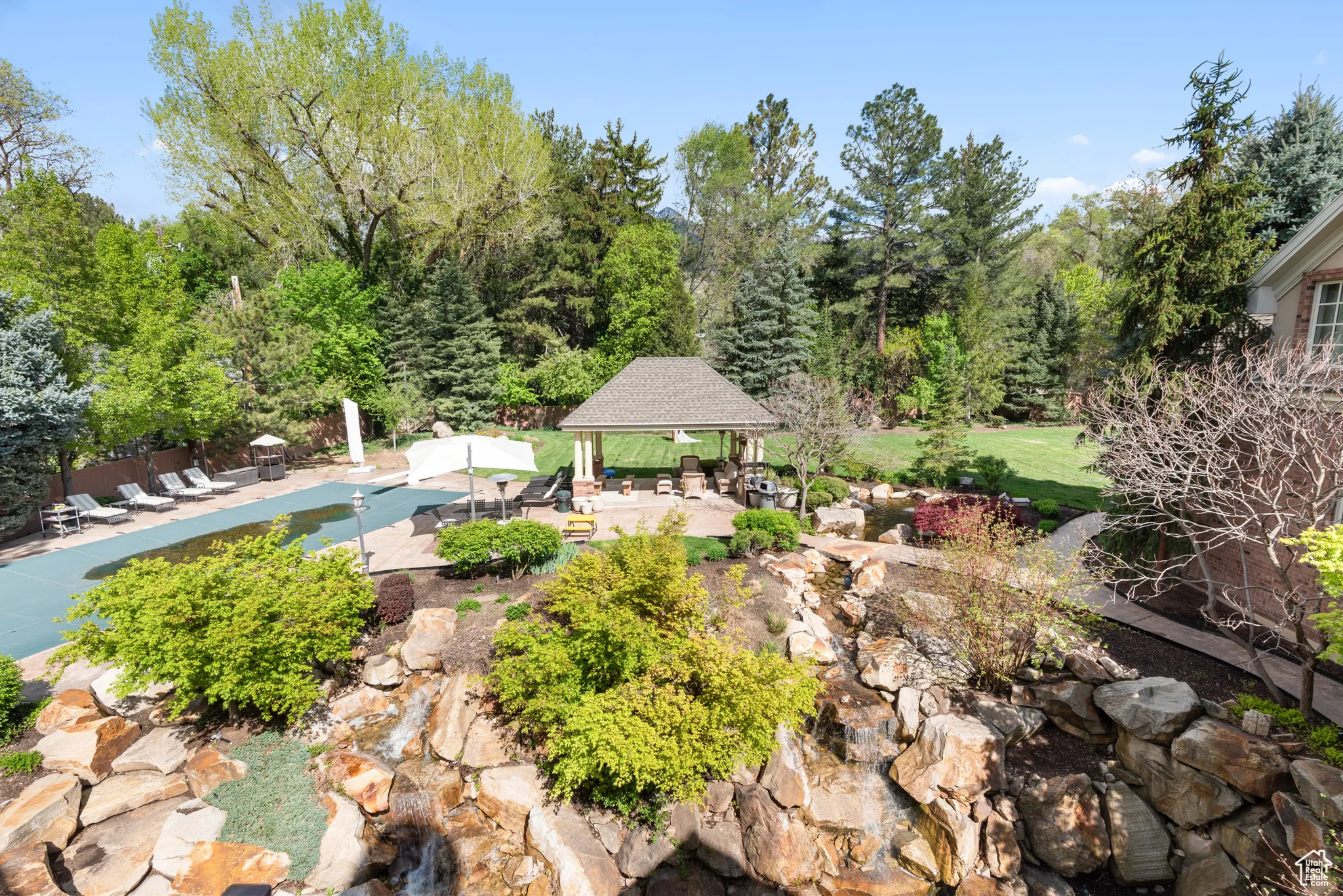 View of home's community featuring a gazebo, a patio area, and a pool