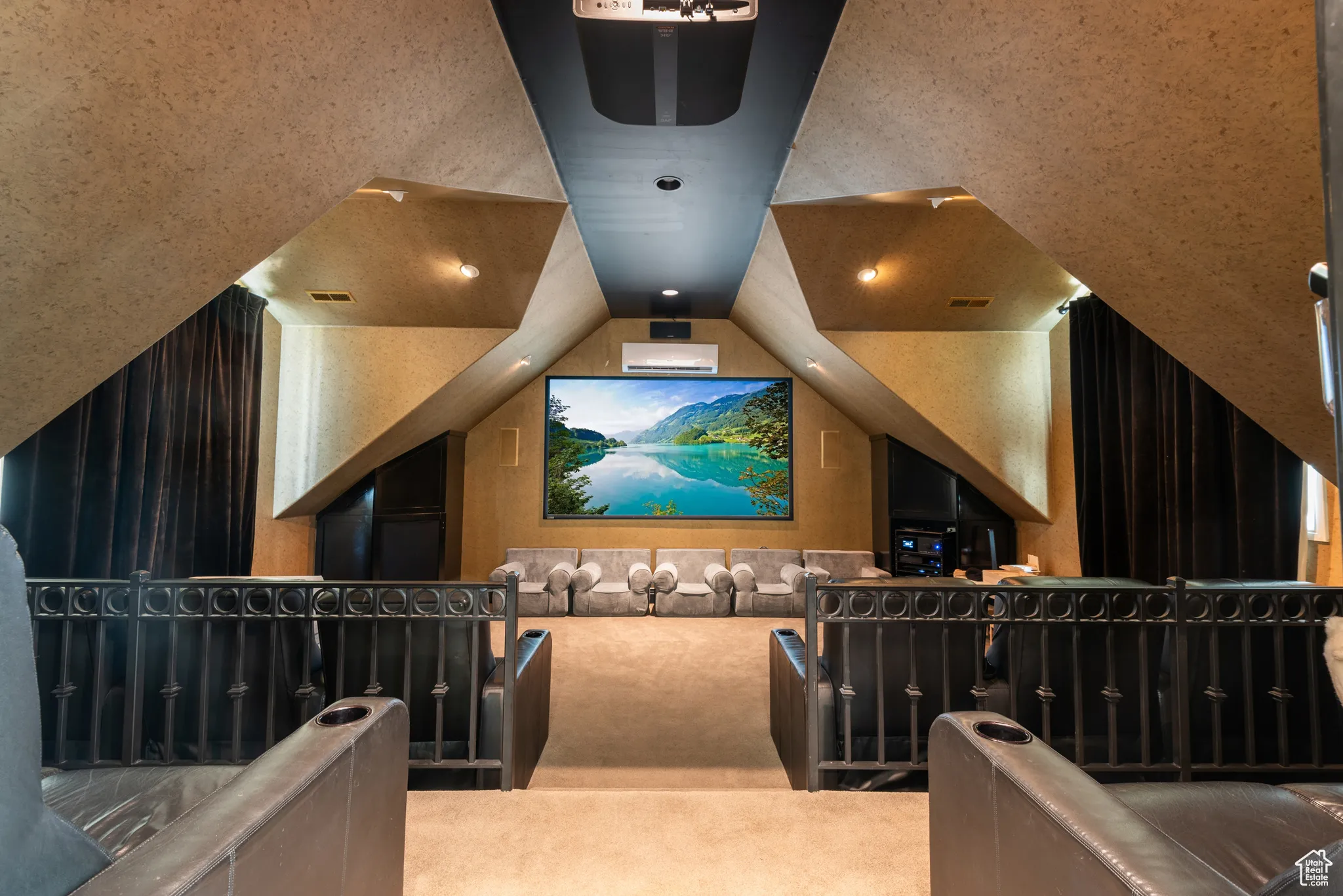 Cinema room featuring carpet and recessed lighting