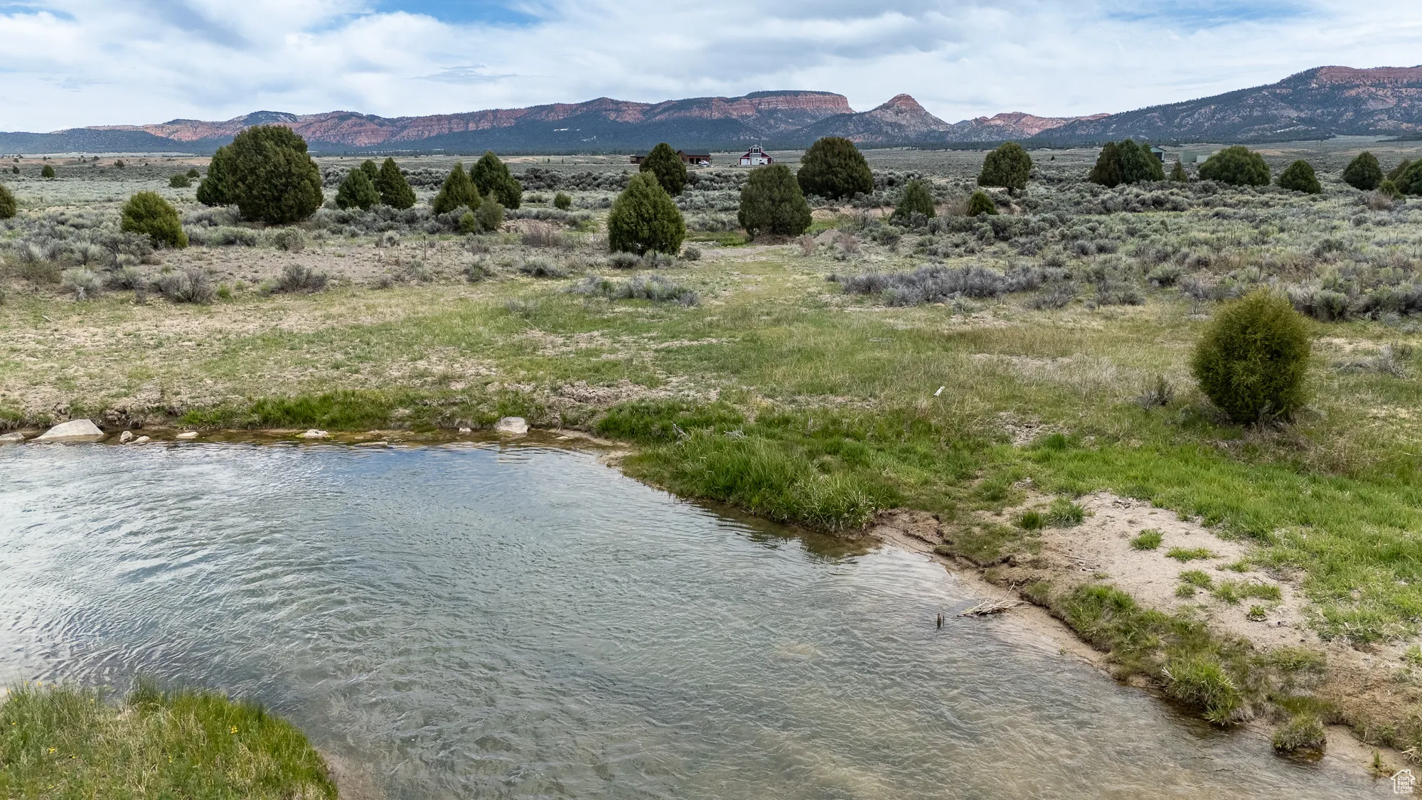 Mountain view featuring a large body of water