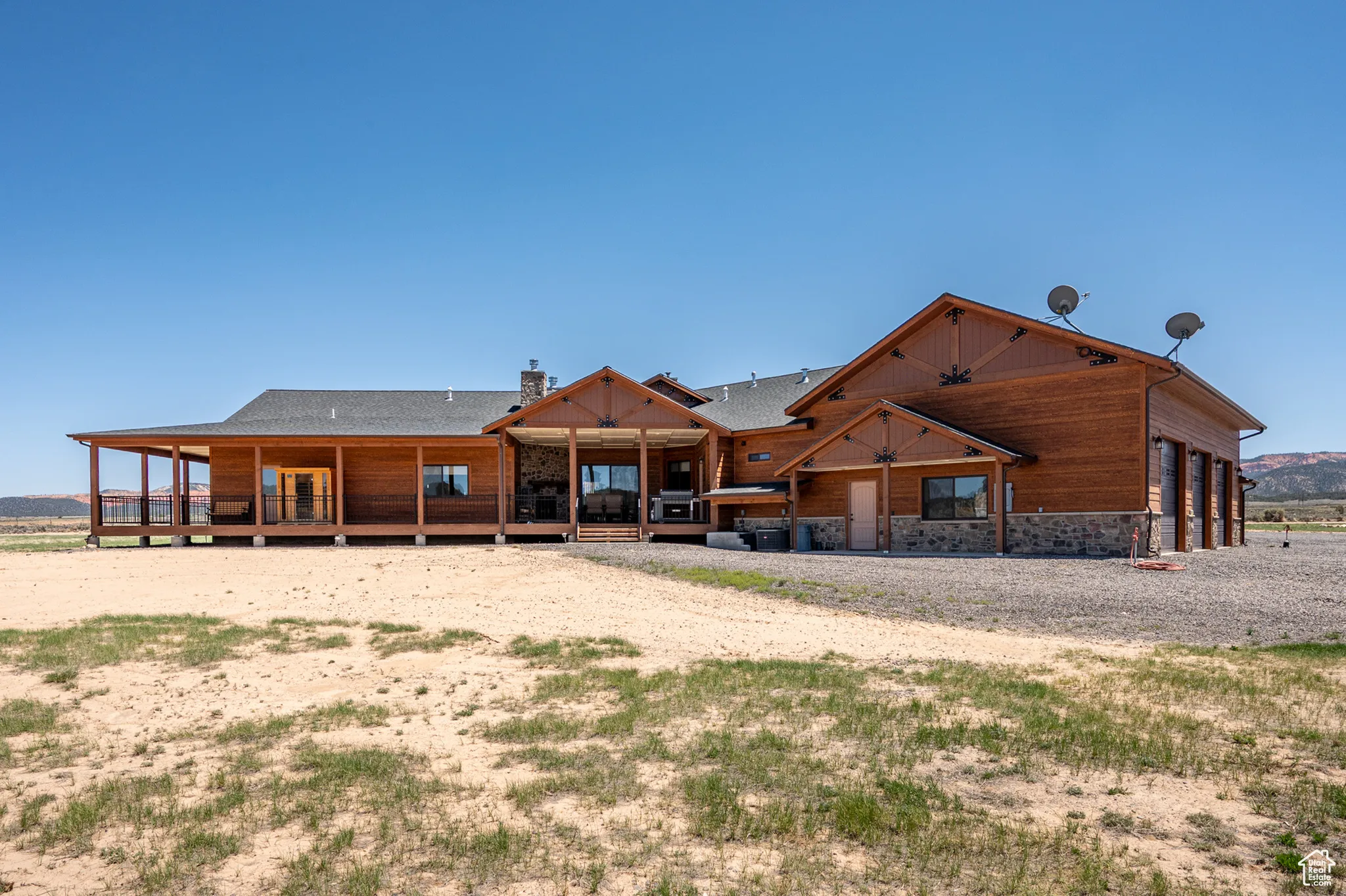 Back of house featuring a chimney