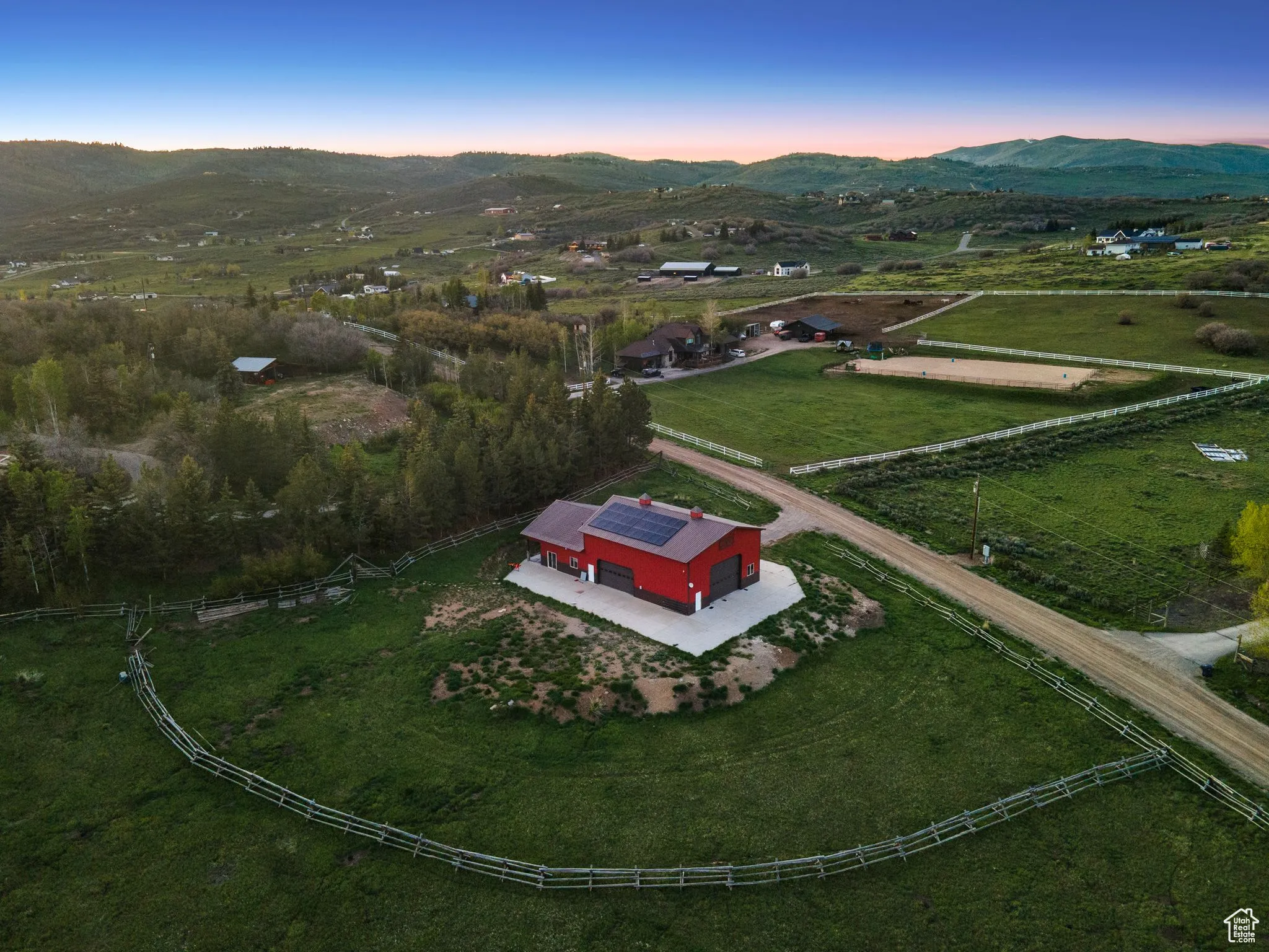 Aerial view of property's location featuring rural landscape and a mountain backdrop