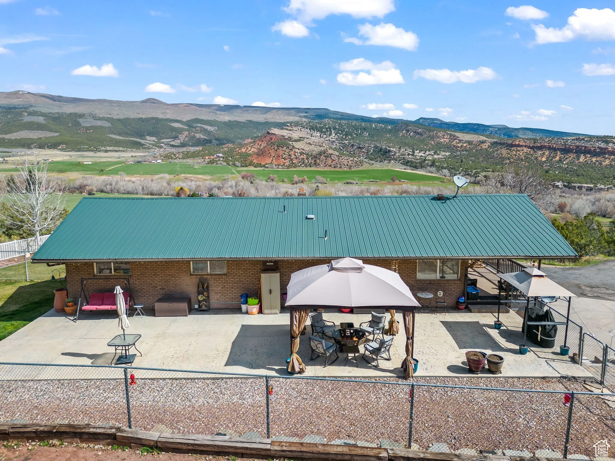 View of subject property featuring mountains