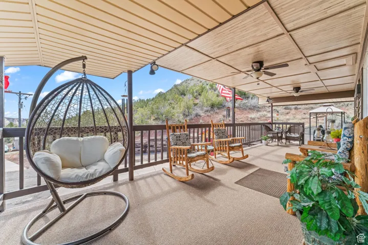 View of patio / terrace with a ceiling fan and outdoor dining space