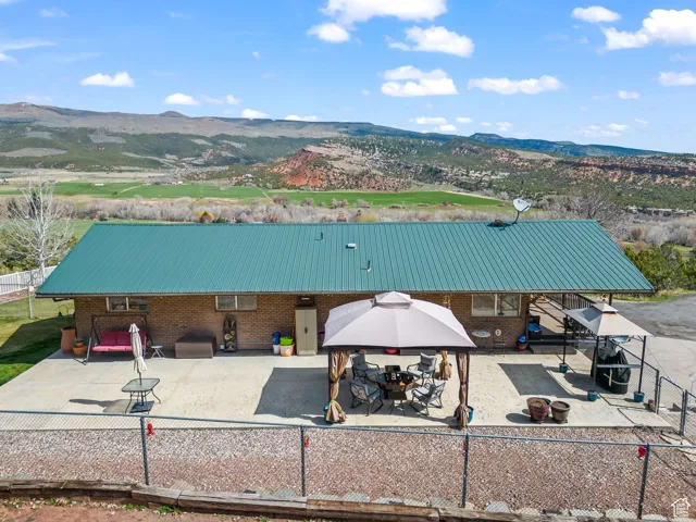 View of subject property featuring mountains