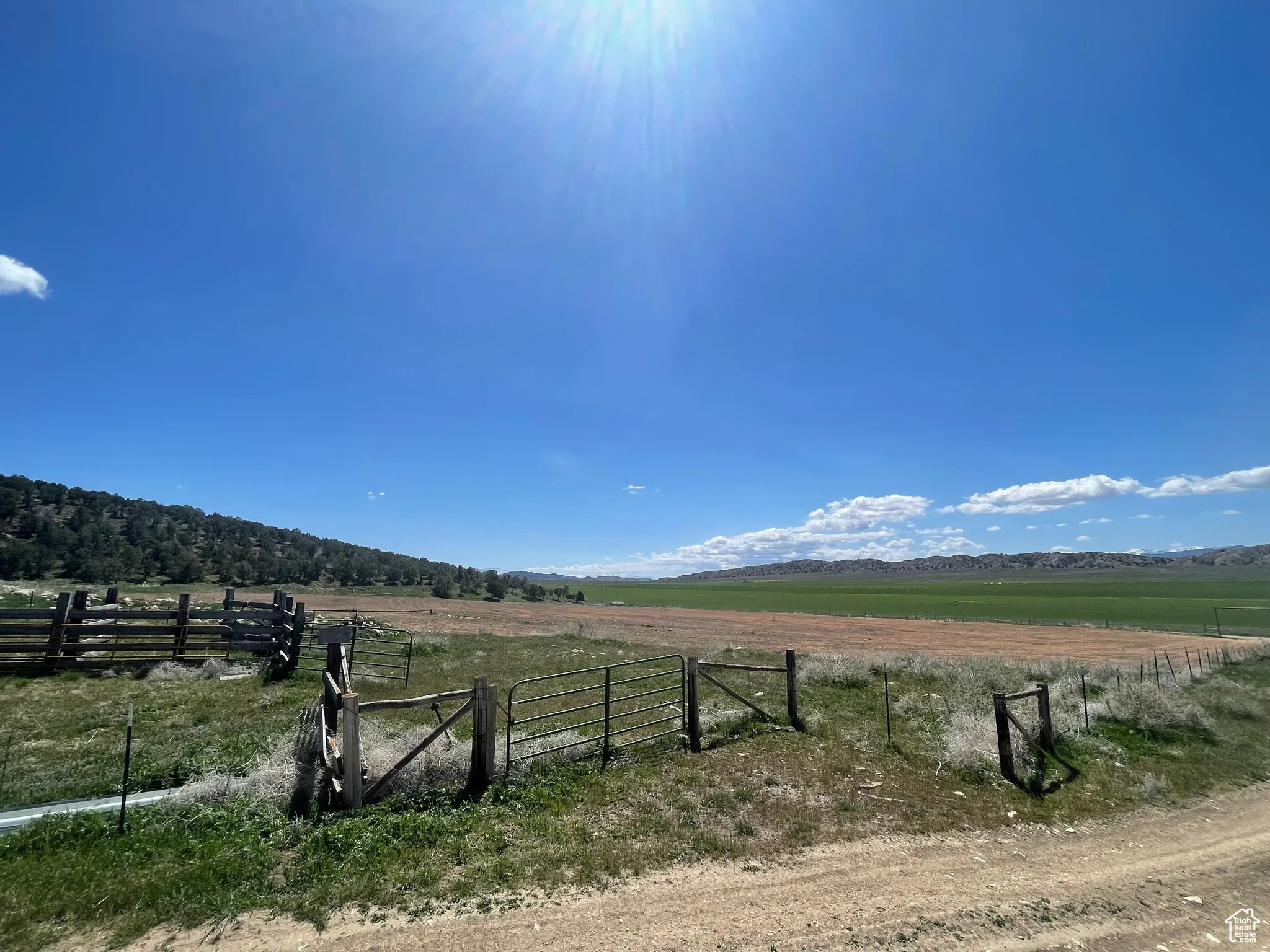 View of yard featuring a view of rural / pastoral area and fence