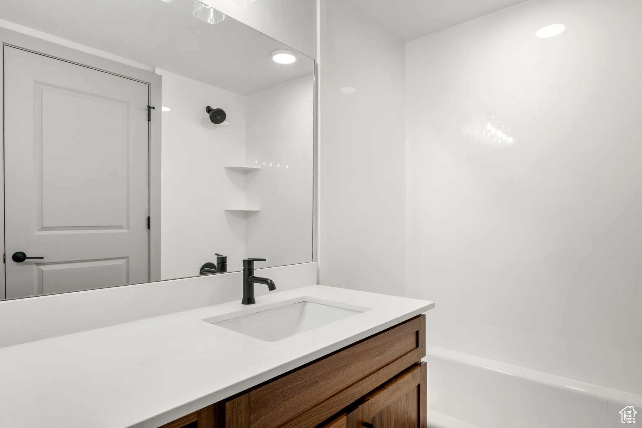 Full bathroom featuring vanity