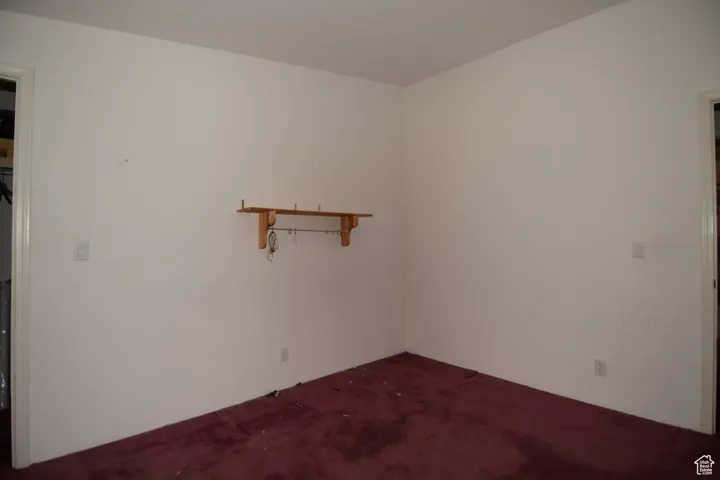 Spare room with carpet floors