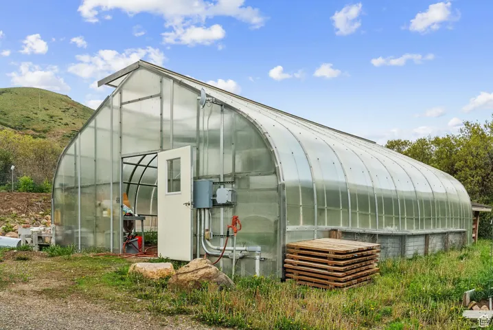 View of greenhouse with a mountain view