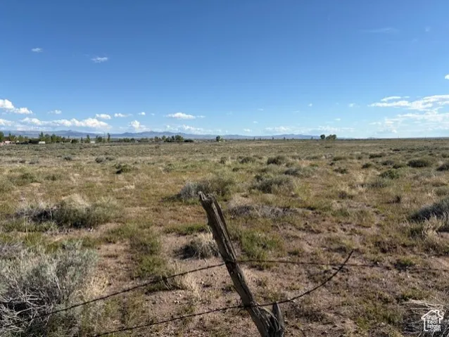 View of yard with a view of rural / pastoral area